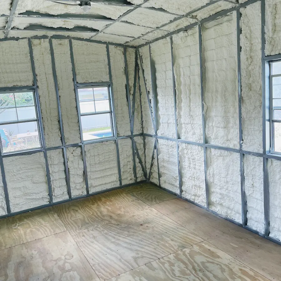 Closed-cell spray foam insulation applied to wall cavities in a residential project in North Plainfield